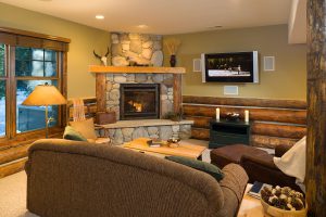 rmr group prc 104 interior living room with river stone fireplace