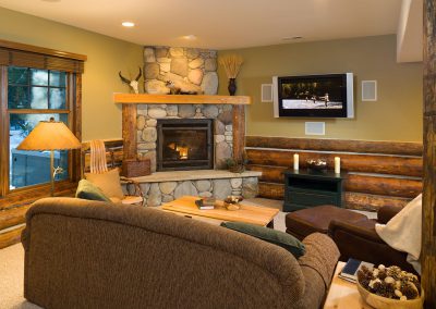 rmr group prc 104 interior living room with river stone fireplace