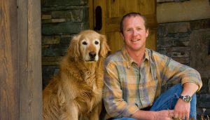 president chad rothatcher and golden retriever