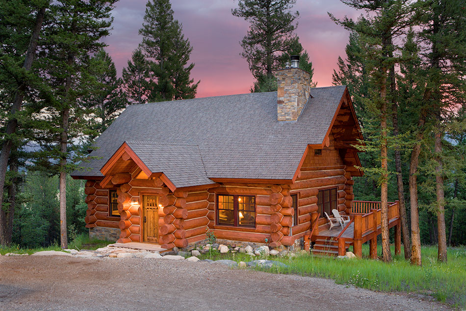 log cabin residence at sunset