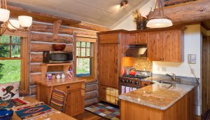 kitchen in luxury log home with western decor