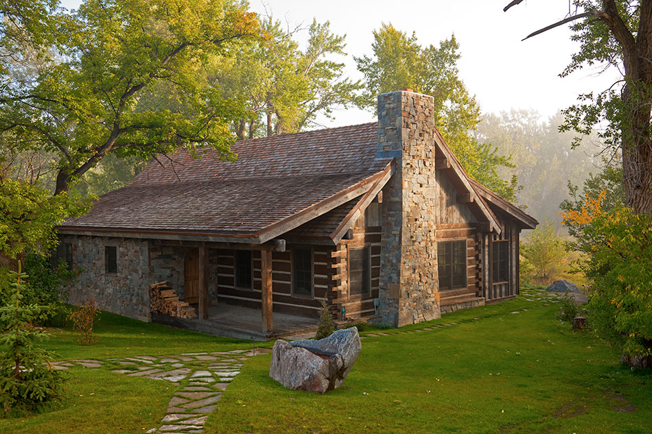 log cabin with stone chimney
