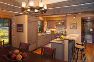 summer cabin interior kitchen with cozy chandelier