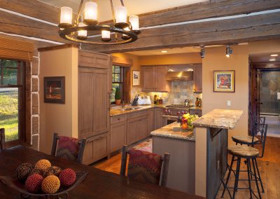 summer cabin interior kitchen with cozy chandelier