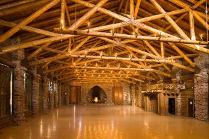 rmr construction interiors large ballroom with decorative wooden beams and stone walls