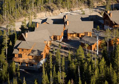 powder ridge aerial view closeup with lift chairs and log cabins